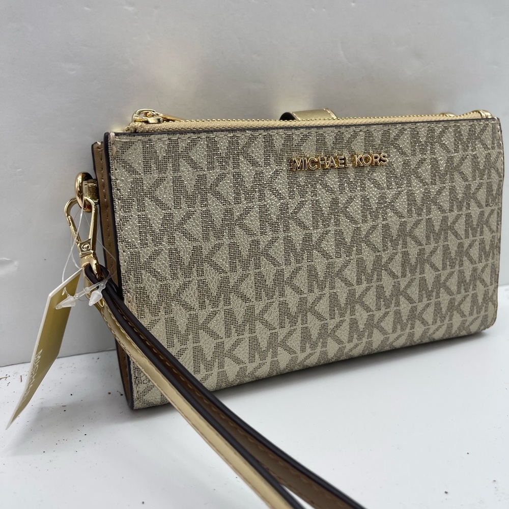 MICHAEL KORS JST Lg Double Zip Signature Logo Wristlet Wallet Phon
Pale Gold
NWT - Picture 14 of 16